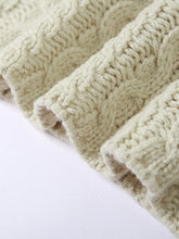 Top corto de punto trenzado